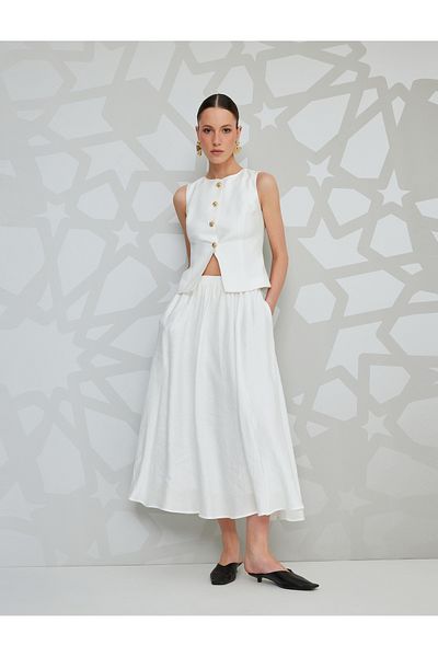 Koton Lined pocketed high rise maxi flare skirt.