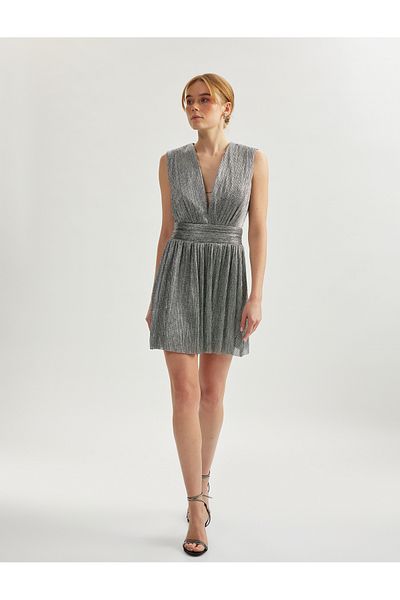 Koton Shimmer v neck back detail sleeveless voluminous mini dress.