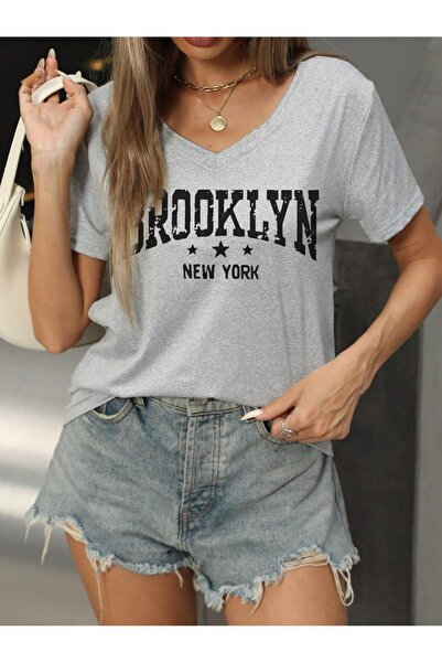 mercoledi Γυναικείο μπλουζάκι Casual V λαιμόκοψη Oversize