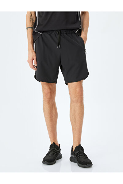 Koton Drawstring parachute fabric zipped pocket detail sport shorts.