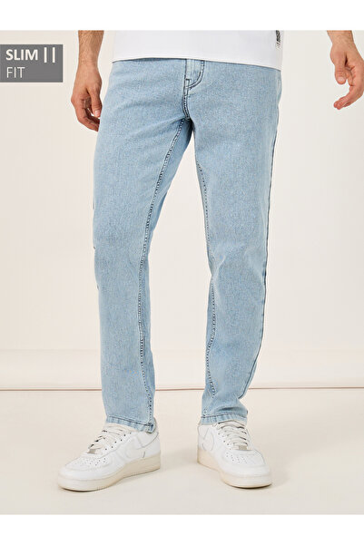 Styli بنطال جينز بقصّة Slim Fit وطول متوسط