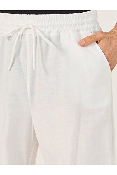 Styli Baggy Parachute Pants with Toggle Cuffed Detail