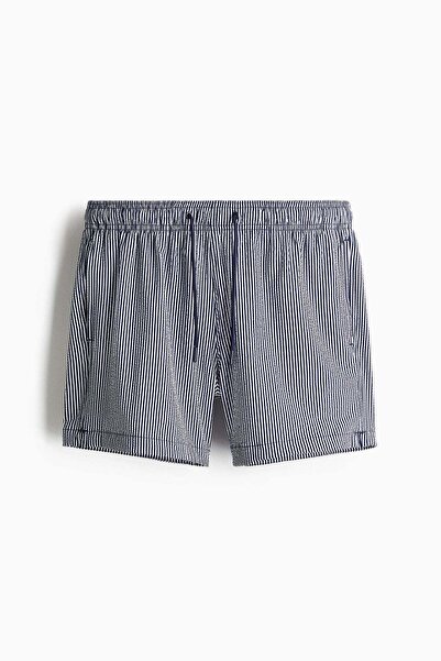 H&M شورت سباحة من قماش السيراكر