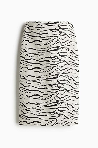 H&M تنورة منسوجة من الجاكار