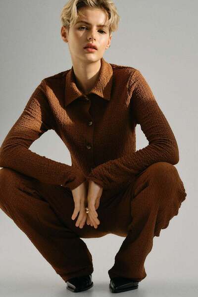 H&M Flared crinkled trousers