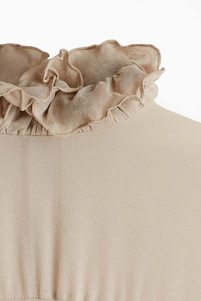 H&M Oversized flounced blouse