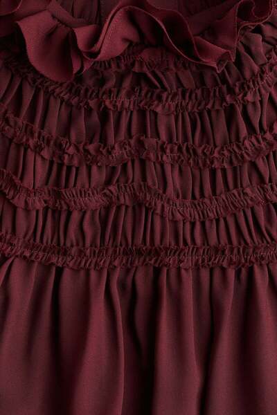 H&M فستان بتفاصيل دخانية