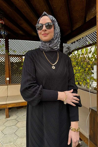 Rabia Şamlı Μαύρο πλεκτό φόρεμα βροχής