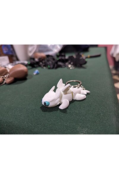 WELLCUT سلسلة مفاتيح على شكل غضب الضوء