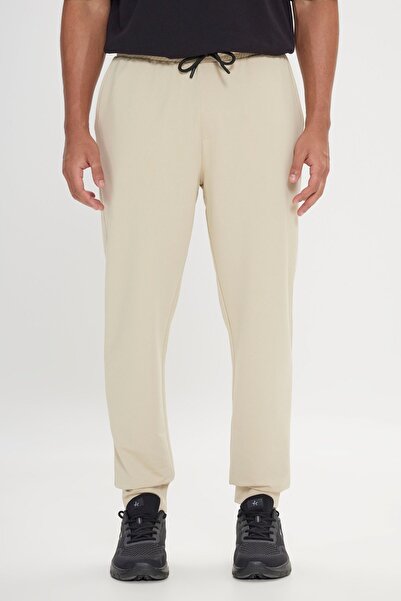 AC&Co / Altınyıldız Classics Άνετο αθλητικό αθλητικό παντελόνι κανονικής κοπής σε μπεζ κανονική εφαρμογή με ελαστική μέση και πόδια