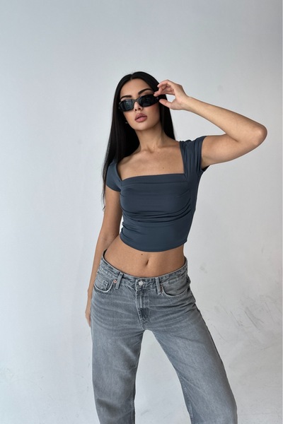 Les Séduisantes c.a. Asymmetrical Cut Diver Fabric Blouse