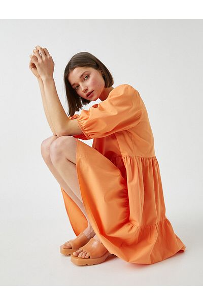 Koton Midikleid mit Ballonärmeln – Lagendesign