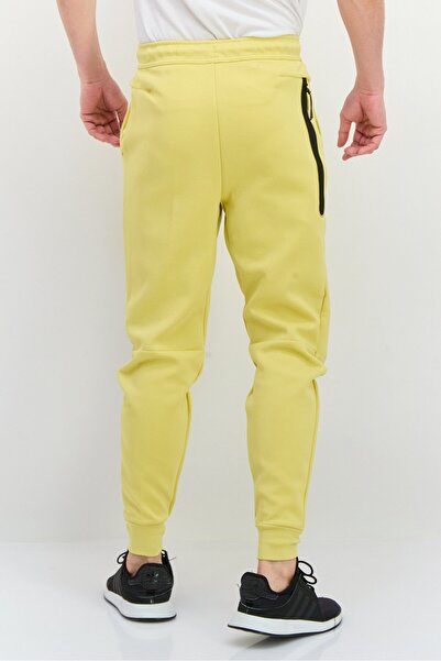 Nike Men Slim Fit Taper Leg Regular Length Training Sweatpants, Yellow