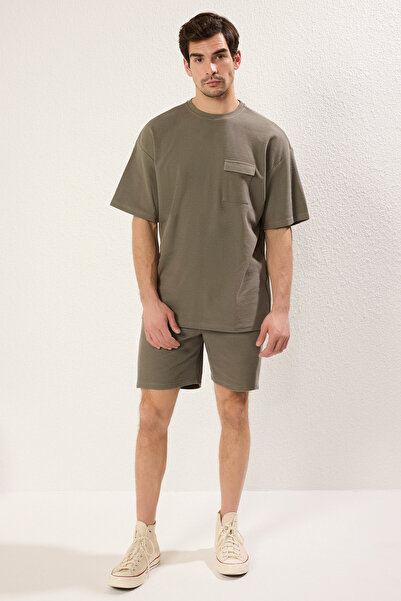 Trendyol Collection Khaki Oversize/Wide Cut Textured Pocket Detailed Short Sleeve Premium T-Shirt Tmnss25Ts00061