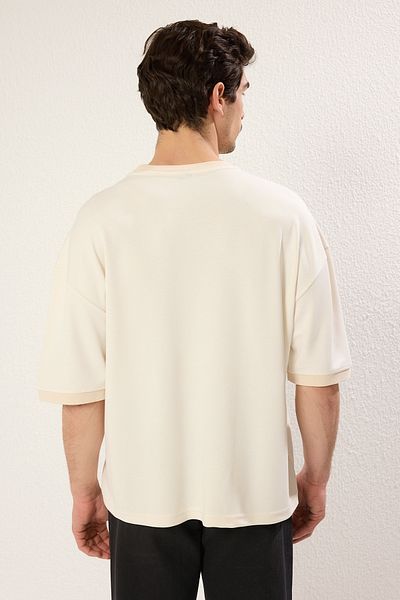 Trendyol Collection Soft Texture Ecru Boxy Fit T-Shirt – TMNSS25TS00078