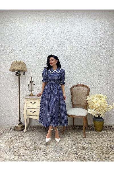 KÜÇÜĞÜM BUTİK Темно-синя сукня в горошок з білим мереживом та розкльошеним коміром