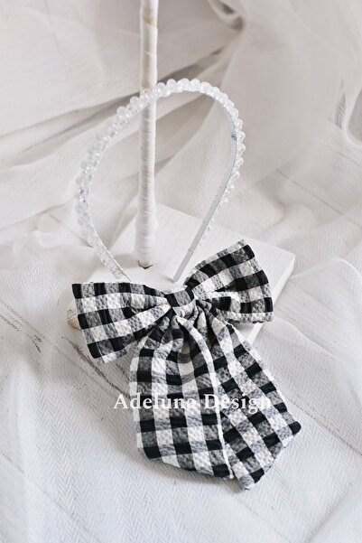 Tasarım مشبك فيونكة منقوش باللون الأسود وتاج من الكريستال الأبيض