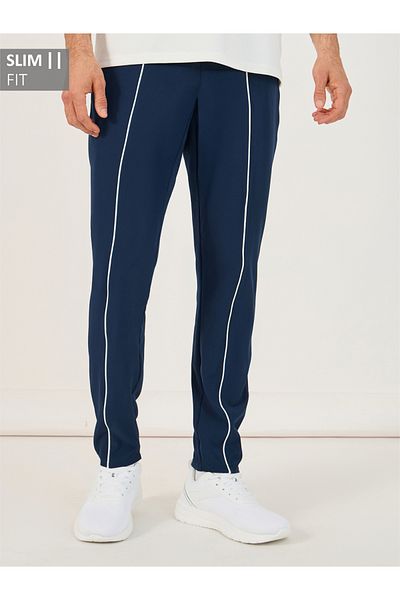 Styli 4-Way Stretch Compression Knit Slim Track Pants with Piping Detail