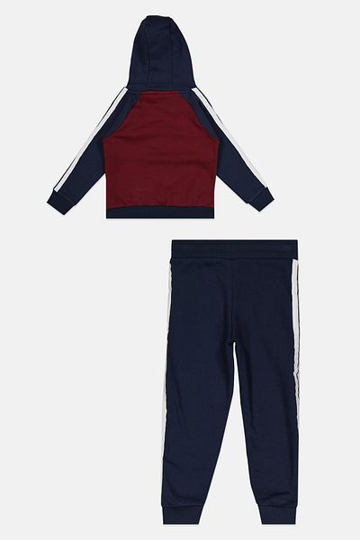 Ellesse طقم مكون من قطعتين من هودي وبنطال رياضي بشعار العلامة التجارية للأولاد الصغار، باللون الأزرق الداكن