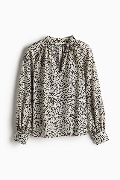 H&M بلوزة كبيرة الحجم