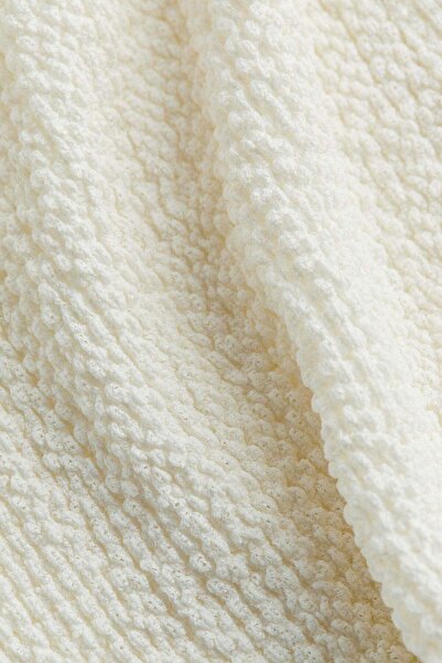 H&M Flared textured trousers