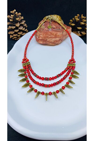 Porsuk Alternatif قلادة نسائية مصنوعة يدويًا من الأرز العرقي مع حجر زجاجي.