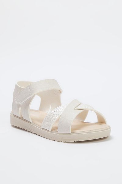 TRENDYOL SHOES Beige Glitzer-Detaillierte Kreuzriemen-Sandalen für große Mädchen TAKSS25SD00026
