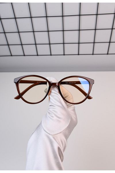 LOOKUP The Cat Eye Glasses with Blue Light Protection are Optically Compatible and Relax in Computer Television vs. Use.