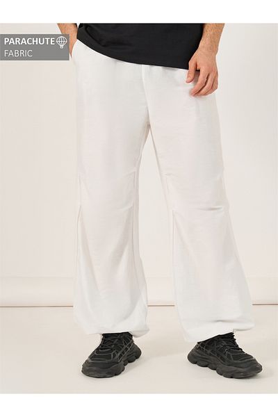 Styli Baggy Parachute Pants with Toggle Cuffed Detail