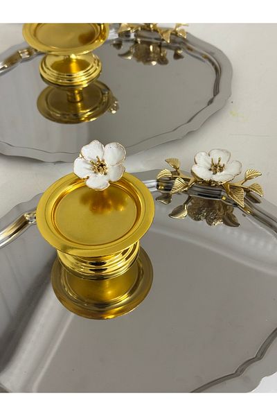 Elzemm store نموذجان من الزهور البيضاء، 3 صواني بيضاوية من الفولاذ و3 أوعية ذهبية