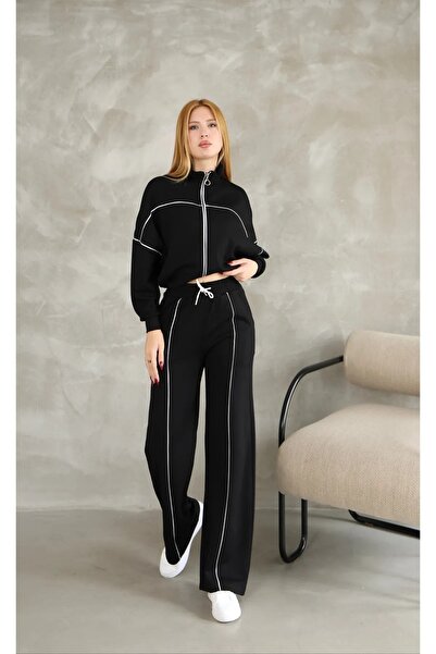 Kayaka triko بدلة رياضية من القماش المشروط بأرجل واسعة مع سحاب