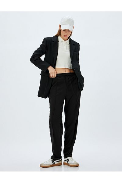 Koton Țesătură creponată cu nervuri - Pantaloni de trening cu buzunare și talie elastică