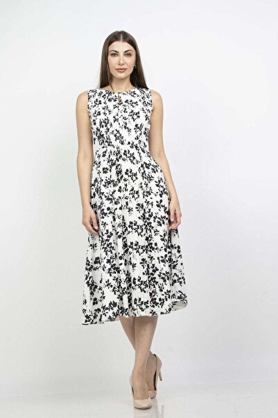 mica فستان ميدي ببلوم بتصميم زهور وقميص بدون أكمام