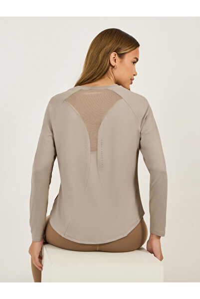 Styli بلوزة بحاشية منحنية وتفاصيل شبكية في الخلف ونقاط عاكسة