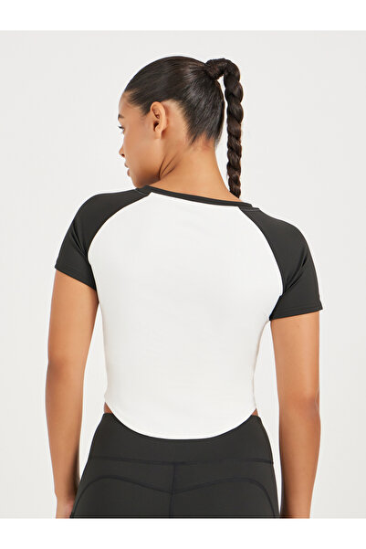 Styli Color Block Side Ruched Curved Hem Short Sleeve Top