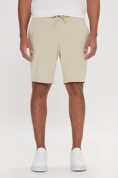 AC&Co / Altınyıldız Classics Εύκαμπτο βαμβακερό σορτς Unisex σε μπεζ χρώμα - με τσέπες, κανονική εφαρμογή