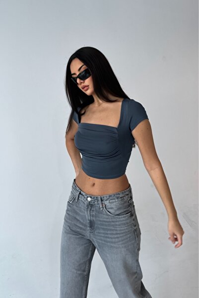 Les Séduisantes c.a. Asymmetrical Cut Diver Fabric Blouse