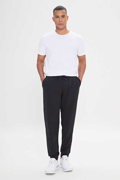 AC&Co / Altınyıldız Classics Pánské černé sportovní tepláky - pohodlný střih a elastický pas a noha