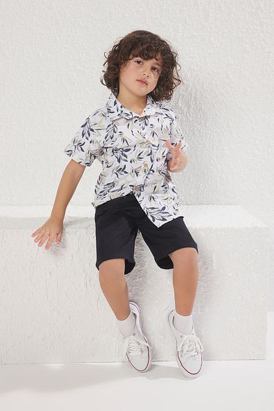 TRENDYOLKIDS Sötétkék nyomtatott szőtt felső és alsó készlet TKDSS25AU00036