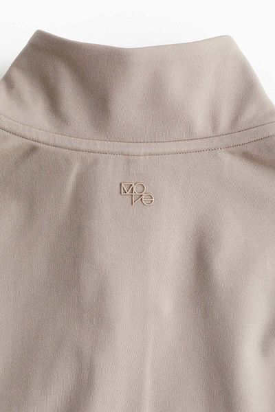 H&M سترة رياضية بسحّاب SoftMove™