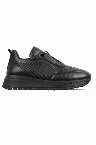 Lal Shoes & Bags حذاء رياضي برباط ونعل عالٍ من الجلد الطبيعي للنساء من Bruno - أسود