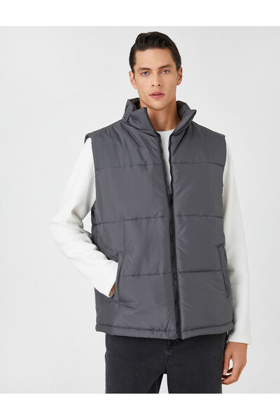 Koton Basic-Pufferweste mit Stehkragen und Reißverschlusstaschendetail