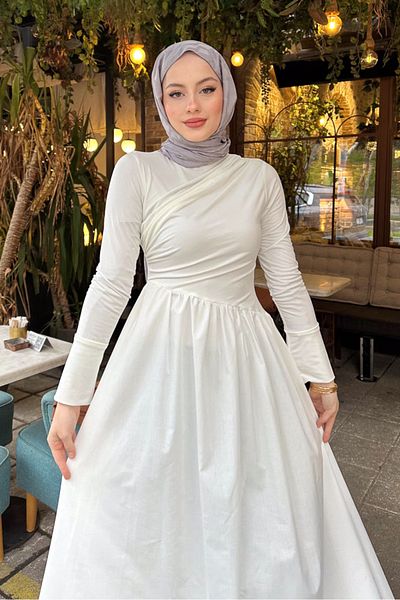 Ovn. Rochie de culoare ecru cu design asimetric