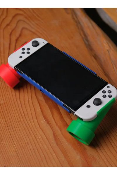 3D Brothers مقبض أنابيب OLED لجهاز Nintendo Switch