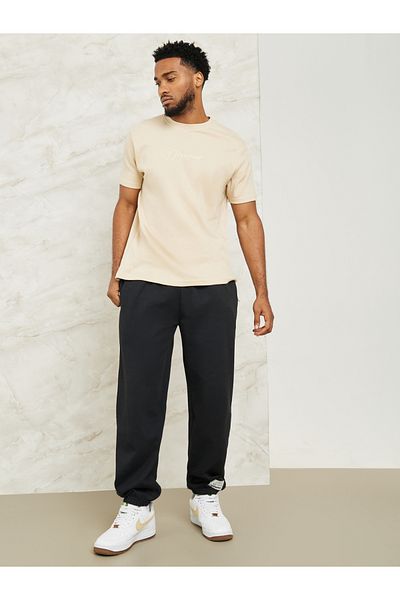 Styli Fleece Badge Detail Relaxed Fit Jogger with Zip Pockets
