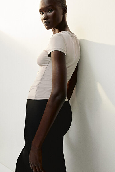 H&M Bedene Oturan Tişört