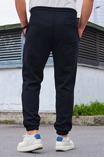 Trendyol Collection Παντελόνι φόρμας μαύρο unisex, κανονικής γραμμής με ελαστική μέση και εσωτερική επένδυση φλις για ζεστασιά, TMNAW22EA0346.