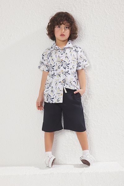 TRENDYOLKIDS Sötétkék nyomtatott szőtt felső és alsó készlet TKDSS25AU00036