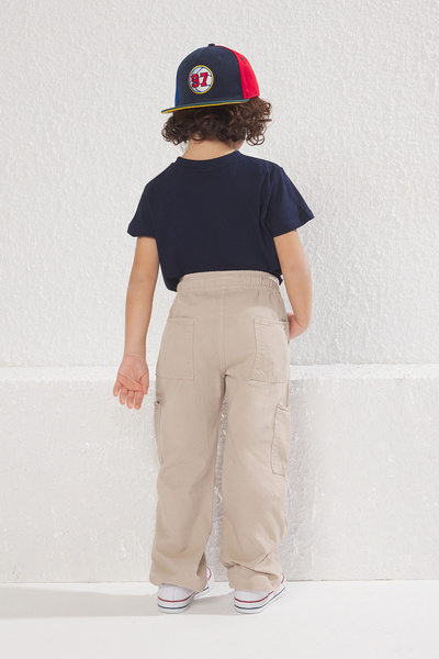 TRENDYOLKIDS Beige Boy's 100% Cotton Elastic Denim Trousers with Pocket Detail