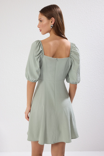 Trendyol Collection Mátové mini tkané šaty s balonovým rukávem TWOSS20EL2314